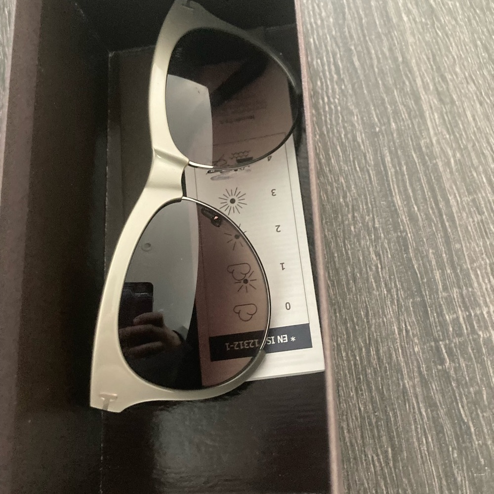 New without tags sunglasses come with the box and the card